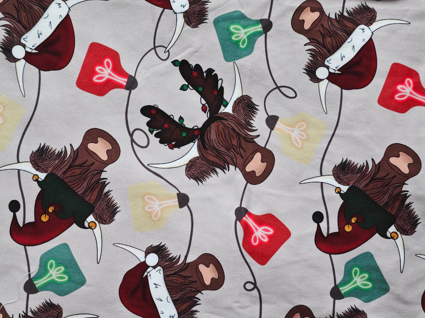 Matching Family Christmas Pajamas in Highland Cow
